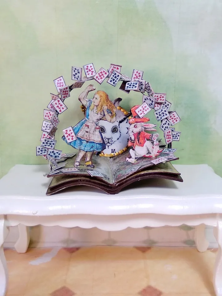 Open book. Dollhouse miniature.Miniature for a dollhouse.1:12 scale.