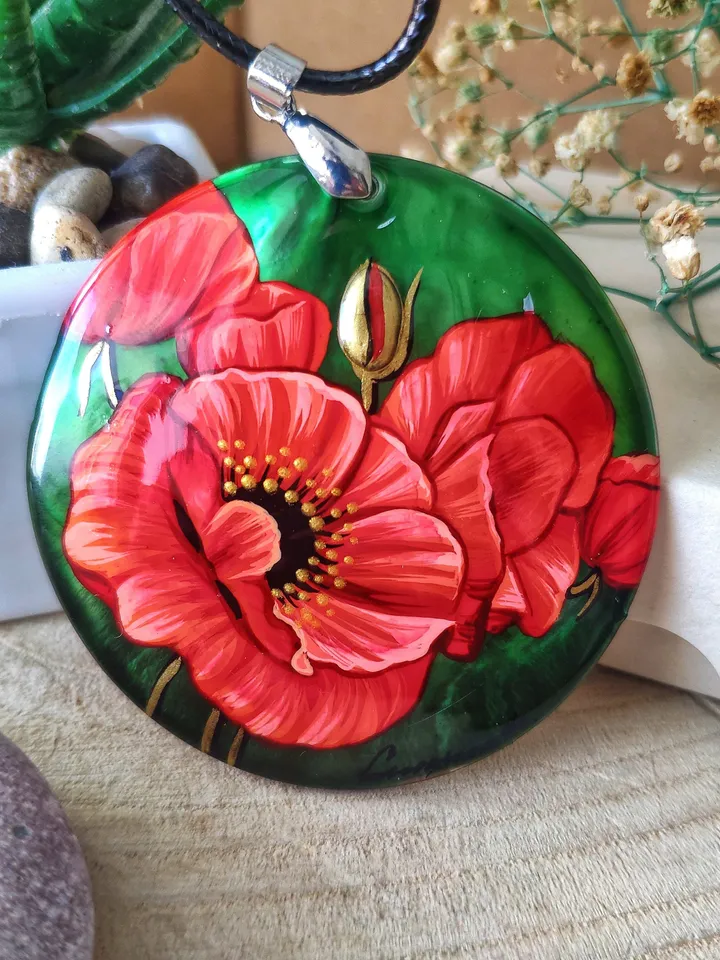 Floral Symphony: Captivating Red Poppy on Iridescent Green Nacre Pendant, a Stunning Blend of Nature and Artistry, Icon of Love and Passion