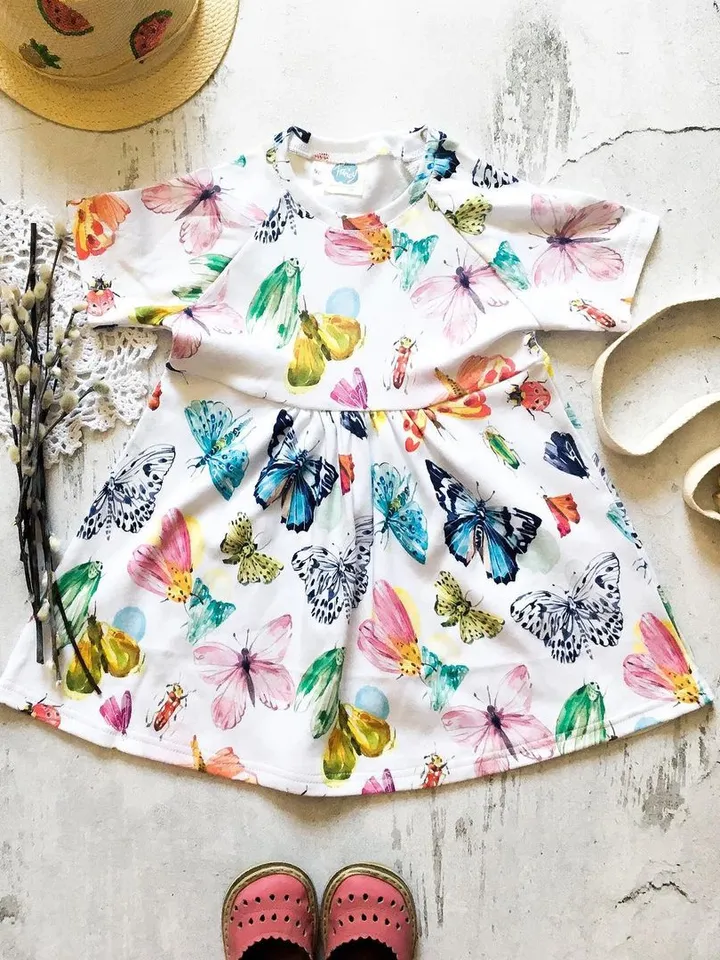 Light knitted dress with butterflies