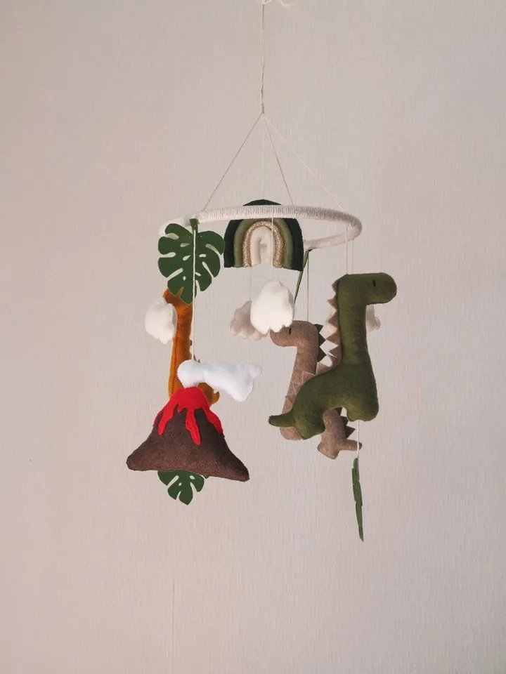 Dinosaur crib baby mobile with rainbow cloud star monstera. Baby shower gift ide