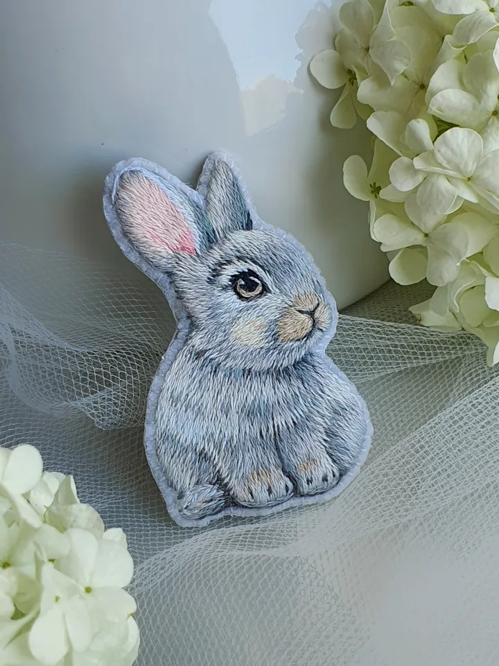 Tiny Bunny Brooch. An embroidered brooch in artistic satin stitch.