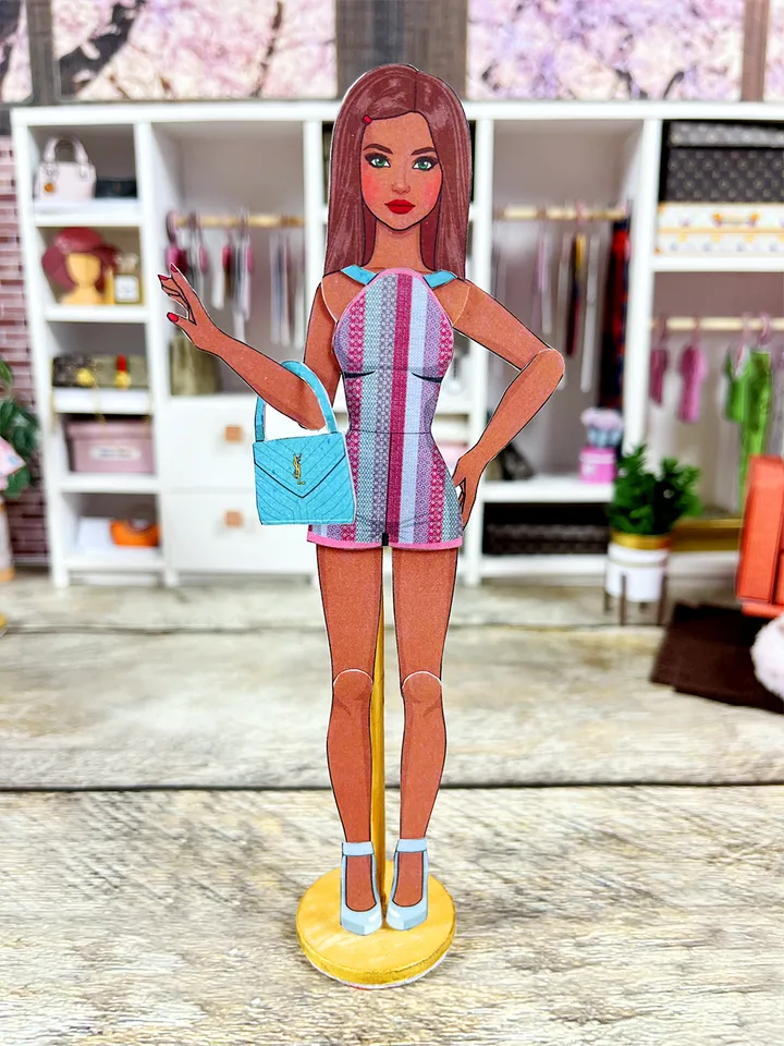 Printable paper doll with summer clothes