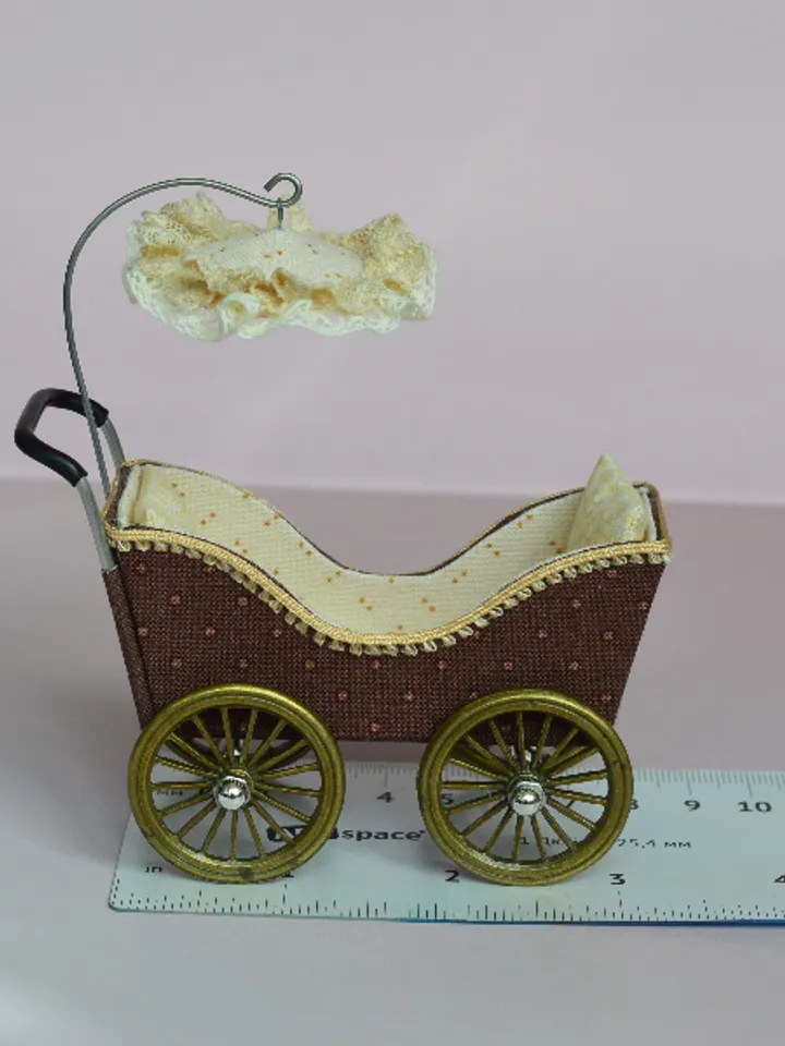 Miniature toy stroller for two small dolls. Handmade miniature stroller for small dolls.