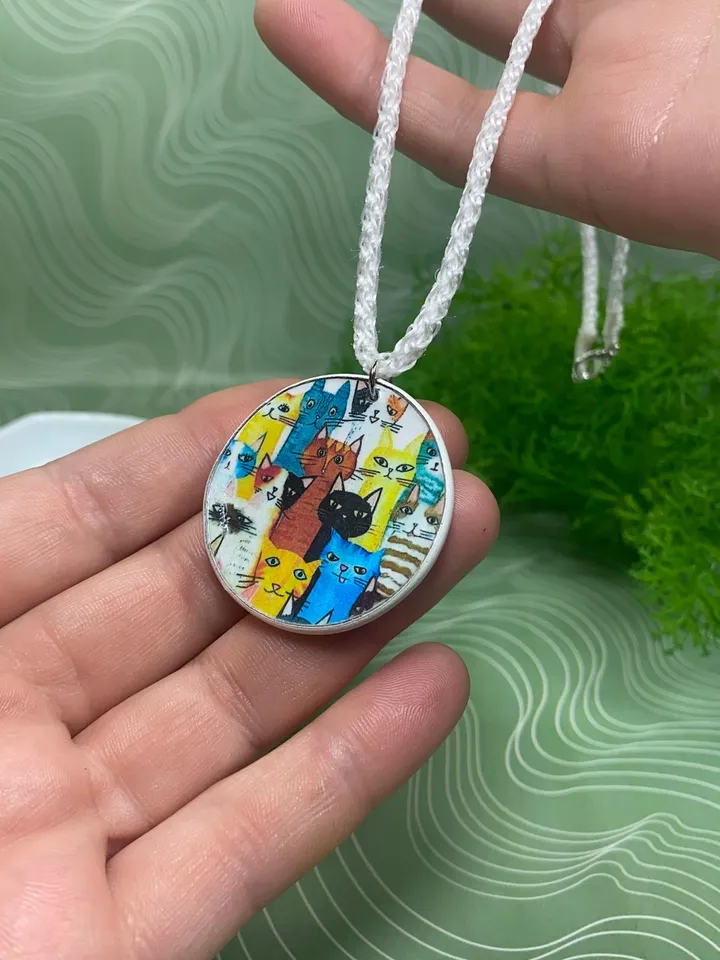 Pendant with kittens. Necklace. Handmade jewelry.Pendant on a cord. Author's design.