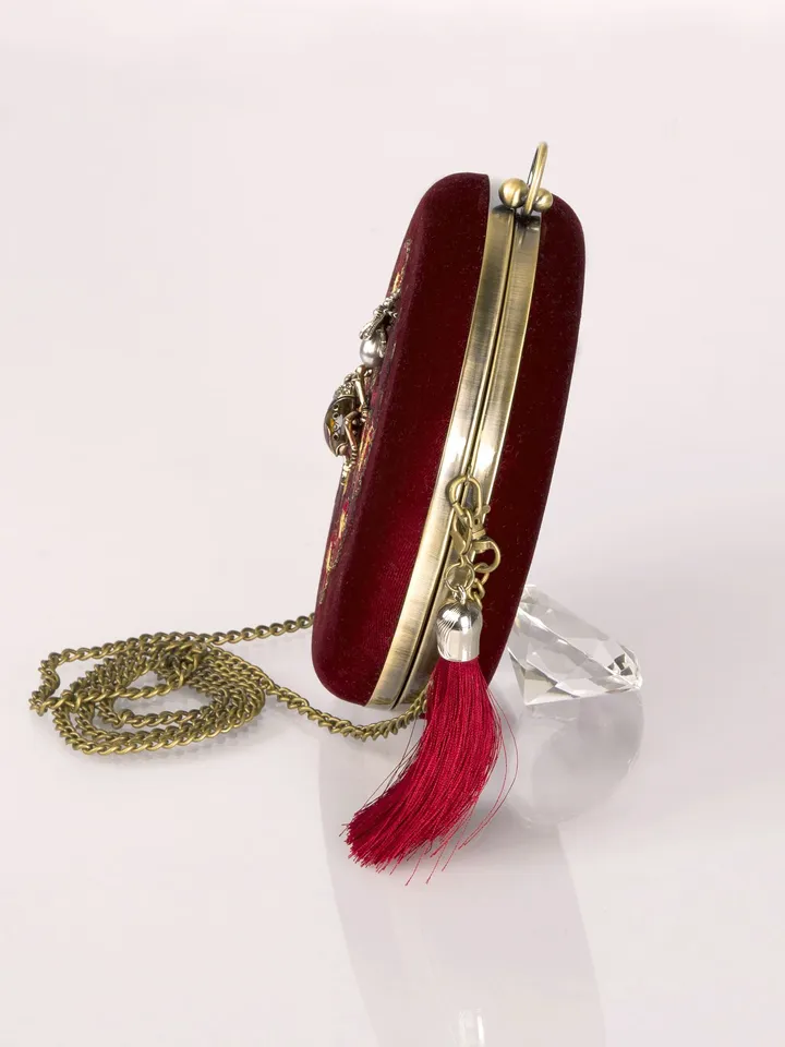 Clutch round burgundy velvet with flower embroidery and beetles