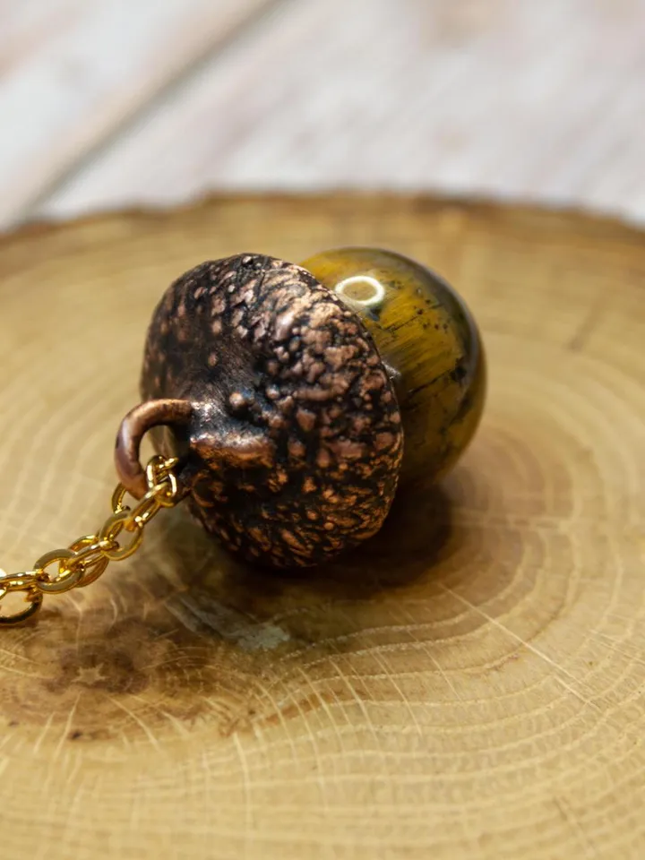 An original handmade electroformed copper pendant made from natural acorn caps in a single copy.