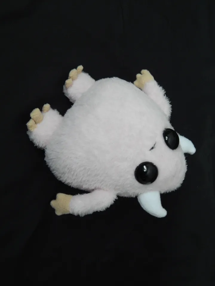 Cute pink fluffy monster toy