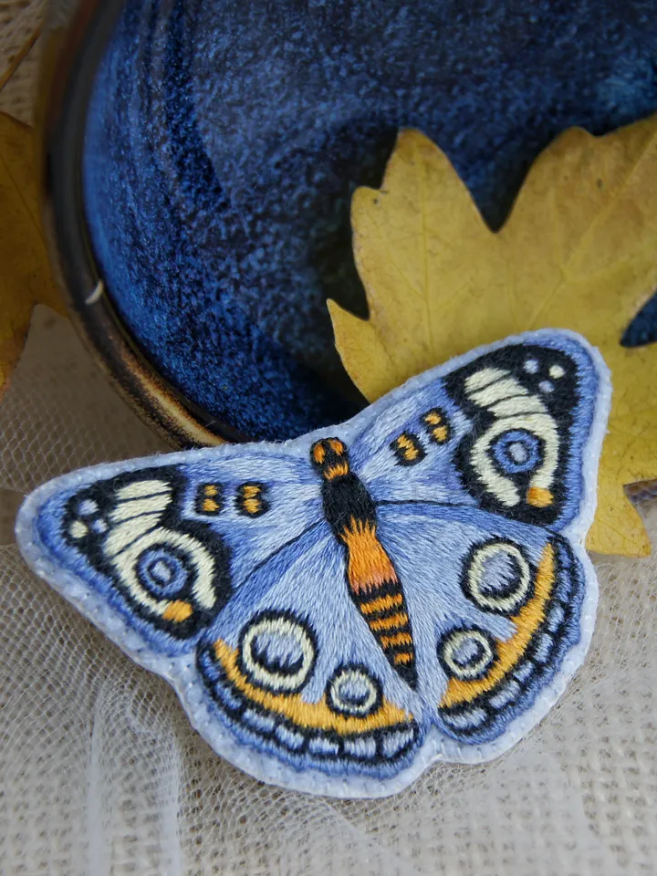 Butterfly Brooch. Embroidered pin brooch. A brooch in the shape of a butterfly.