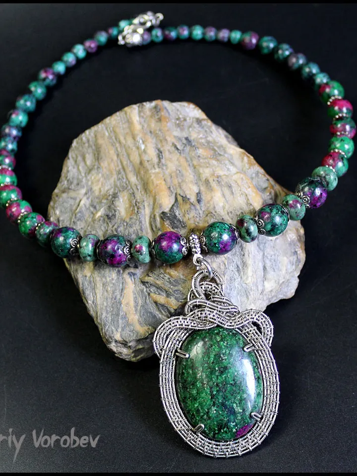 Handmade necklace with a pendant made of natural Zoisite and nickel silver wire.