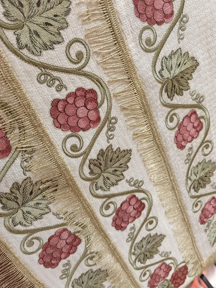"EMB Grapes tapestry" is a working file format.