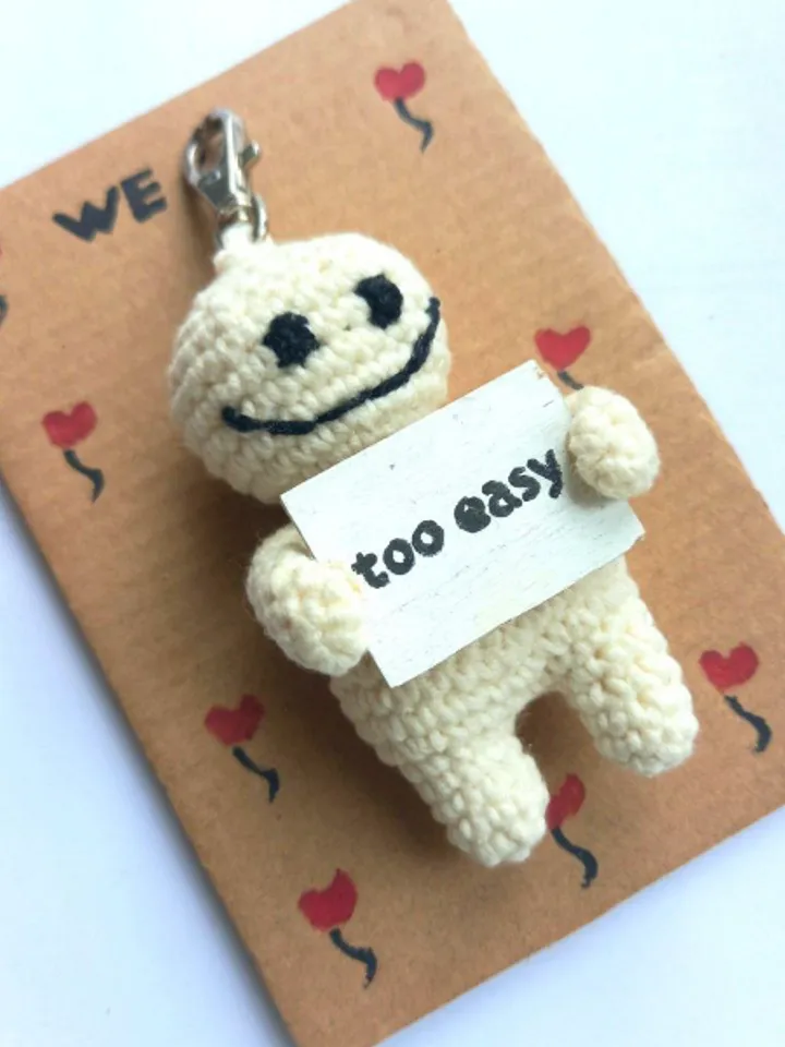 The keychain "too easy" for a bag or keys, a toy in the car interior, a pendant for the rearview mirror