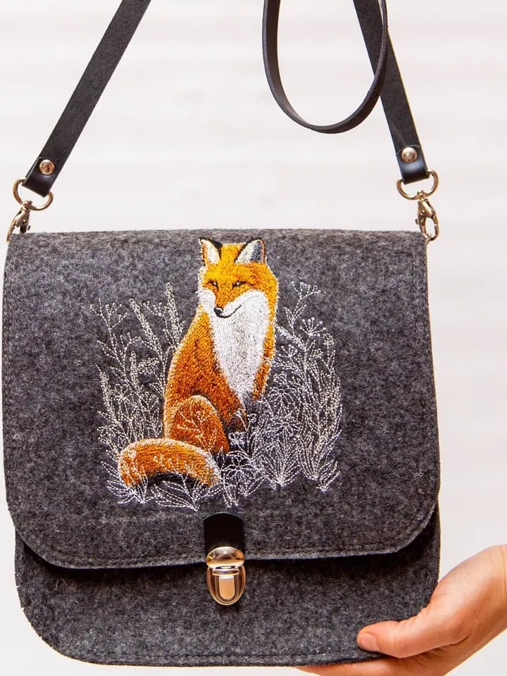 A handbag with a fox