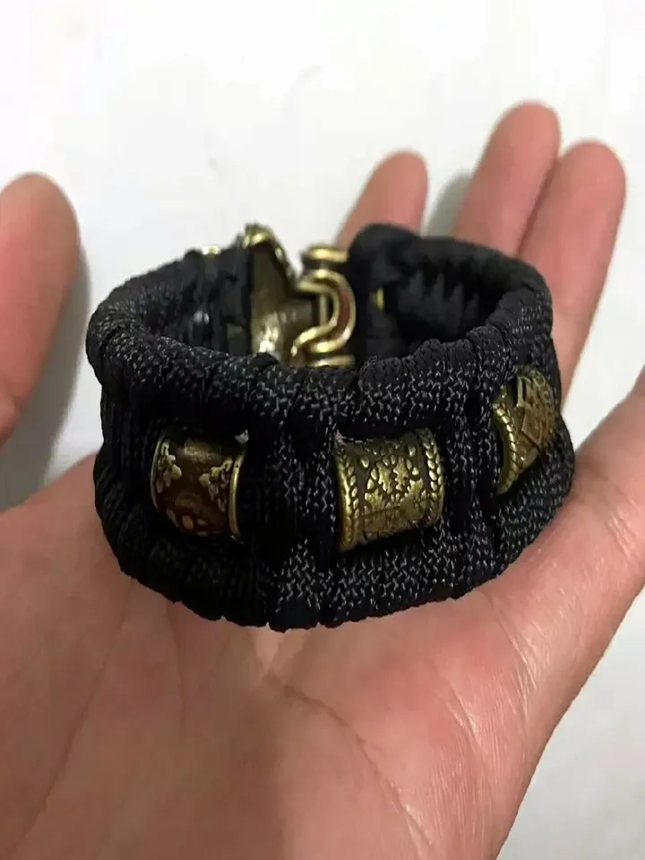 Paracord and bronze bracelet with wolf head