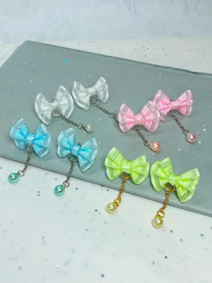 Handmade bow earrings. Author's work. Bright jewelry.