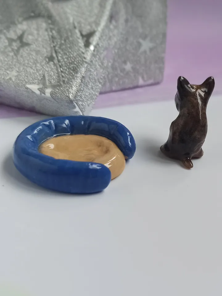 a brown bull terrier figurine (US discount)
