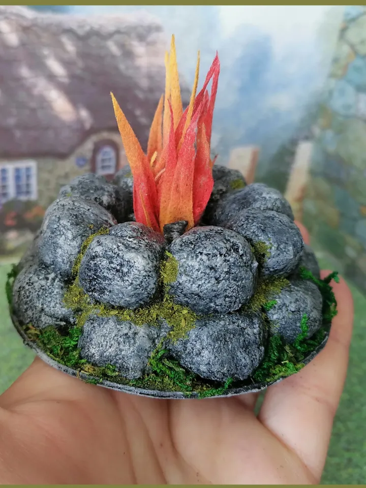 Bonfire with lighting. Dollhouse miniature 1:12. Realistic fire. LED candle. Fire for a doll's garden.