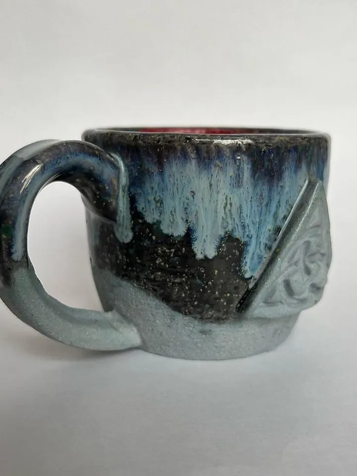 Trinity knot Triquetra in circle blue clay and black galaxy glazed stoneware mug