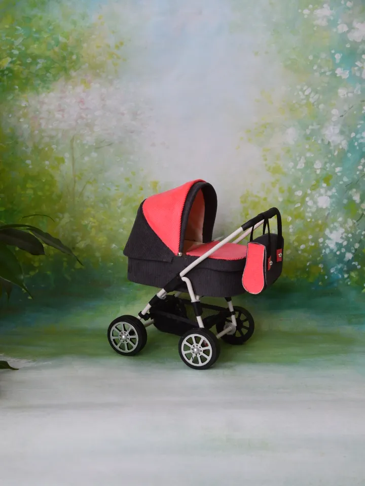 Miniature toy stroller for Barbie dolls.