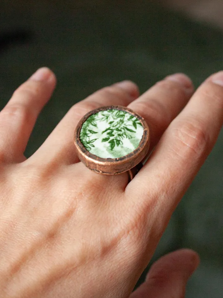 Unique handmade porcelain ring in a copper frame made using the electroforming process