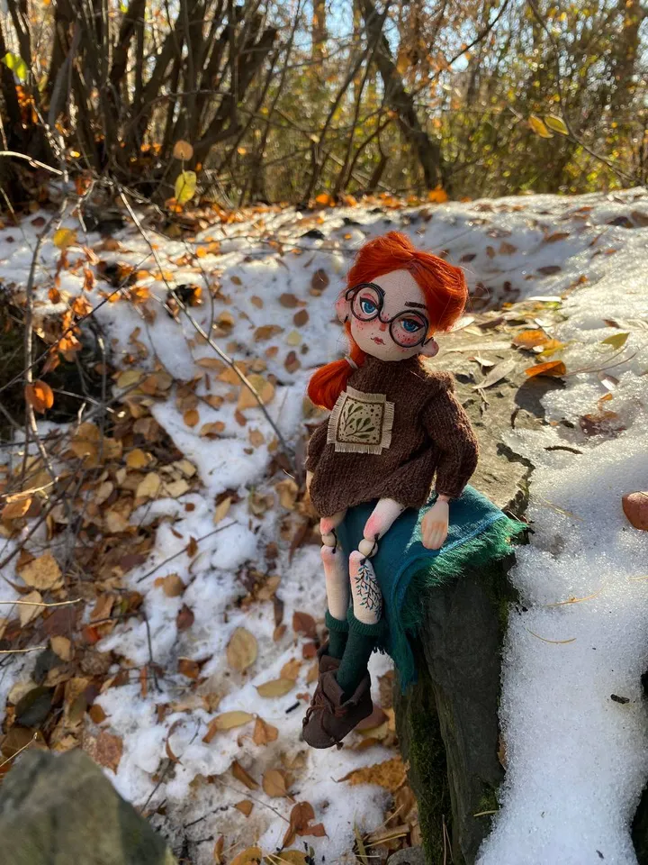 Red-haired doll with goblincore and cottagecore style with tattoos