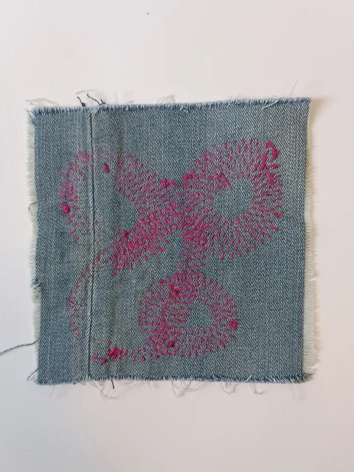 Upcycled denim boro patch. Sashiko stitching.