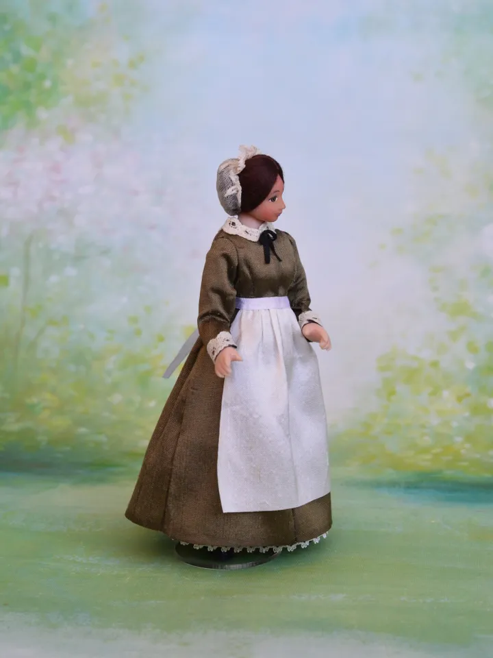 Miniature nanny doll for Victorian dollhouse in 1/12th scale.