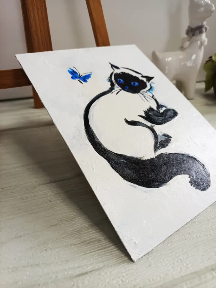 Painting with a kitten and a butterfly. Painting on cardboard 6" x 8". Acrylic. Author's painting.