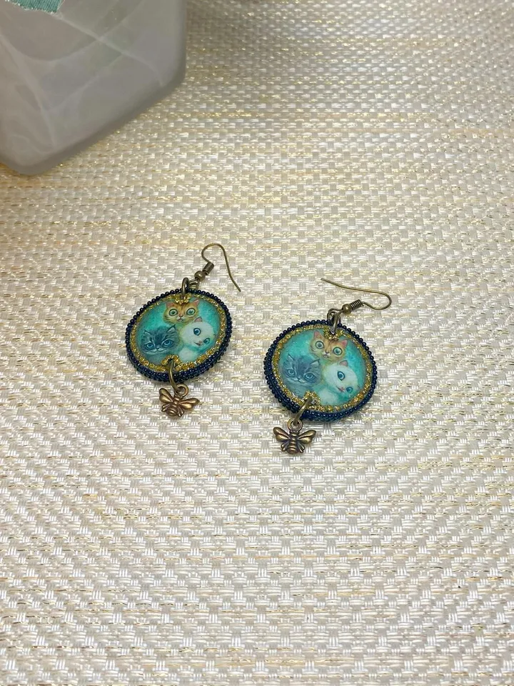 Earrings with cats. UV resin. Handmade.