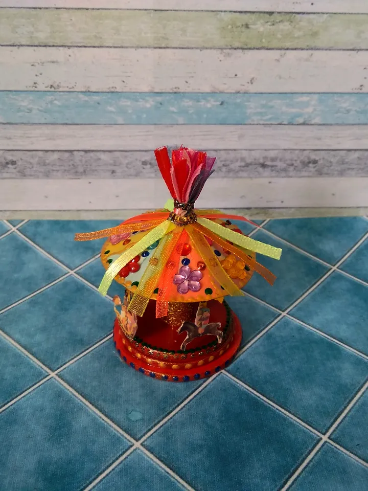 Miniature carousel. Dollhouse miniature.1:12 scale.