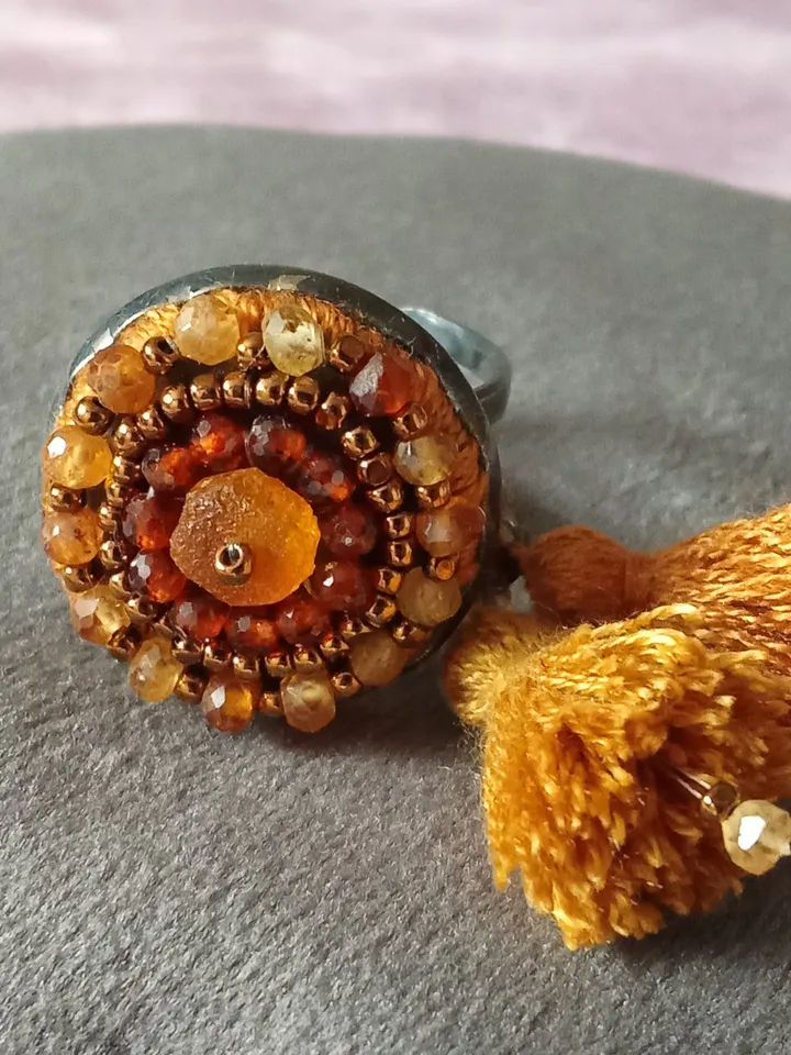 Garnet embroidered ring "Solaris"