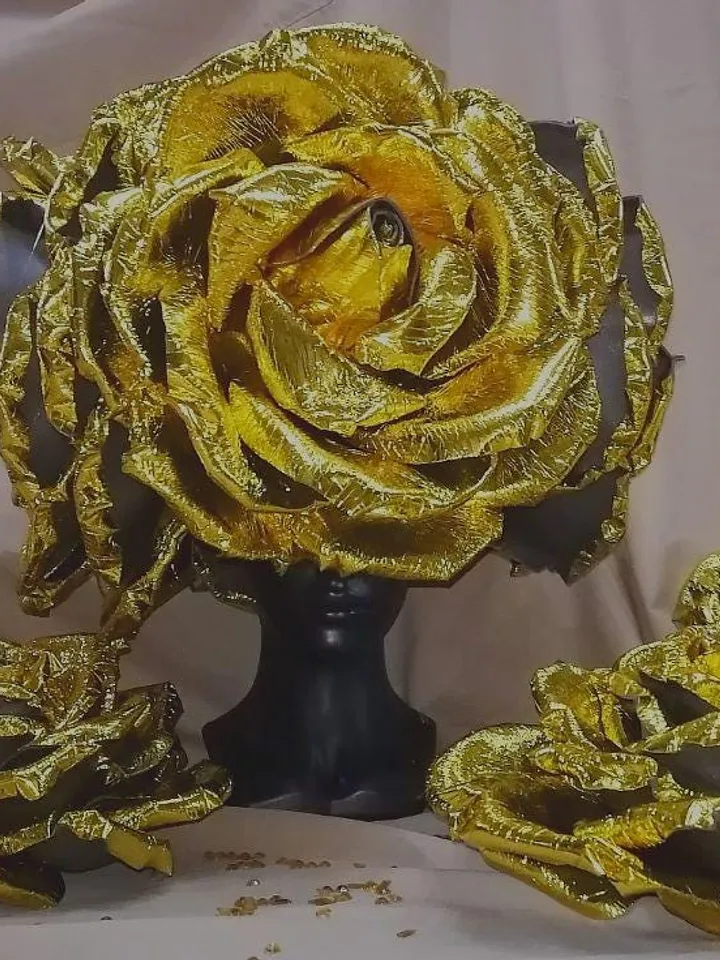 A set of headdress and roses on hands, roses on the head, a headdress from roses, a burning man, festival clothing, a suit for the show,set