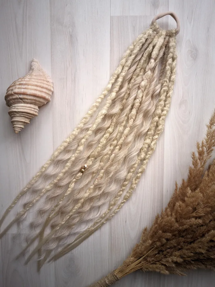 Blonde Dreads with Loose Waves on Elastic Hair Ties Featuring Curly Accents and Gold Beads for Boho Beach or Festival Styles