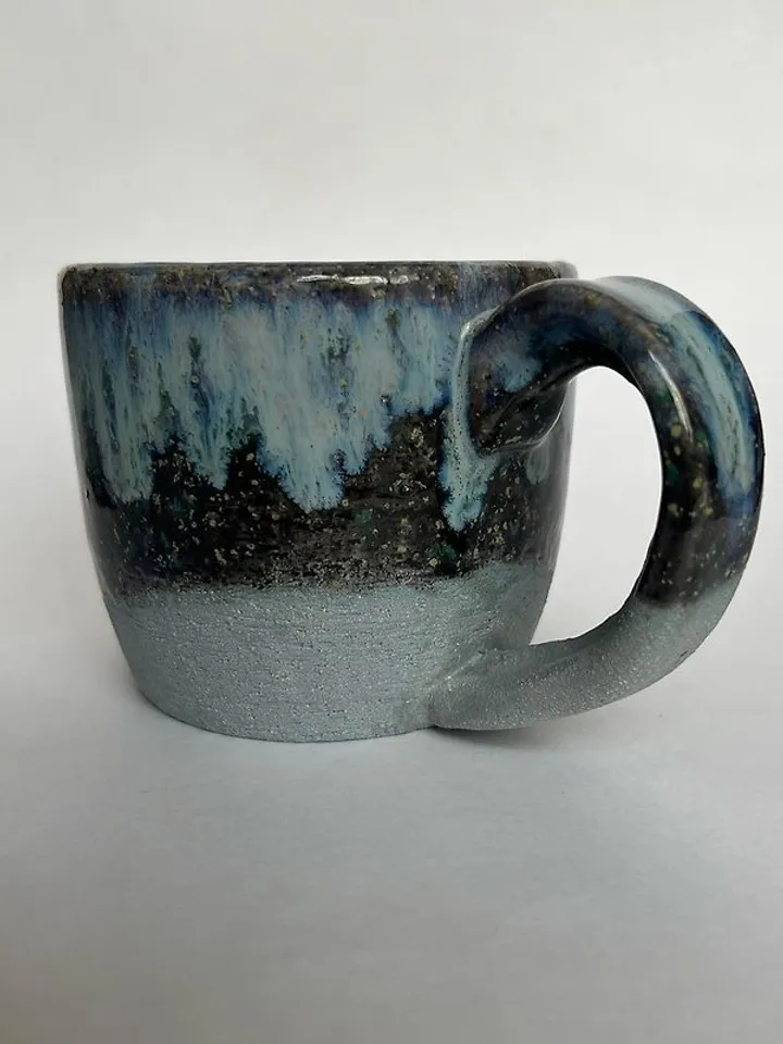 Trinity knot Triquetra in circle blue clay and black galaxy glazed stoneware mug