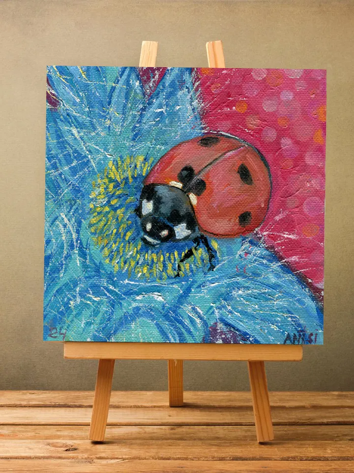 Painting flowers with a Ladybug