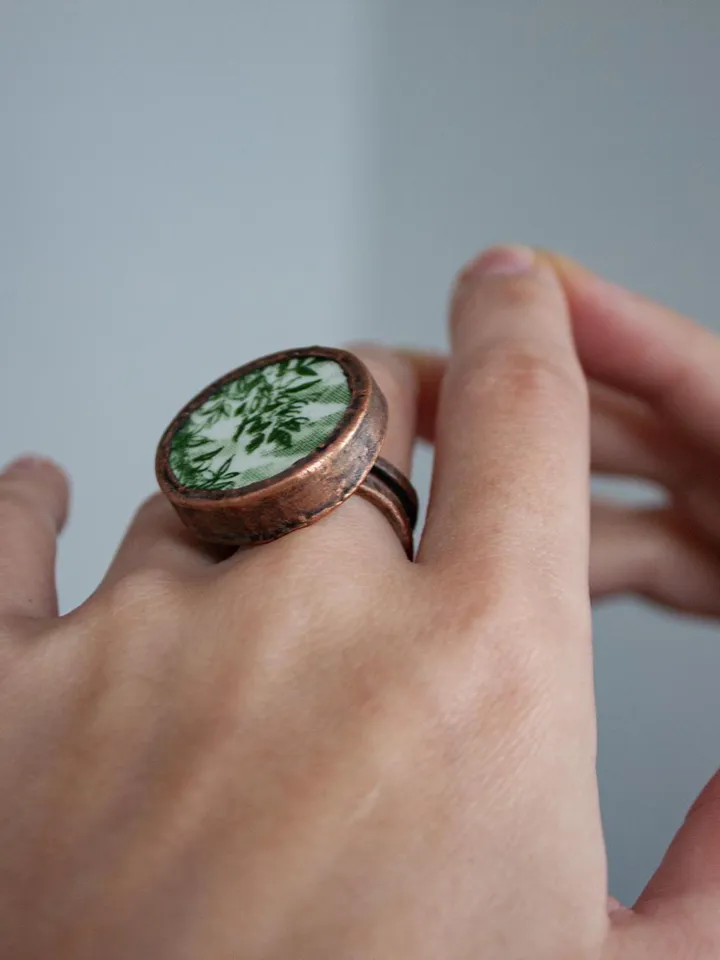 Unique handmade porcelain ring in a copper frame made using the electroforming process