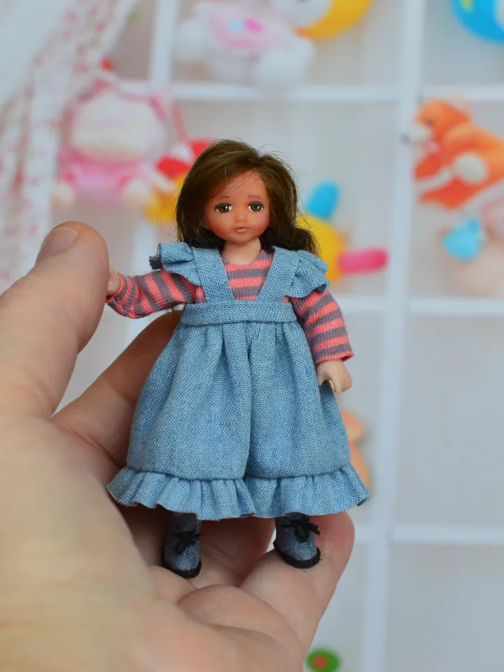 Miniature doll. Doll girl. Doll for a dollhouse.1 12 scale.