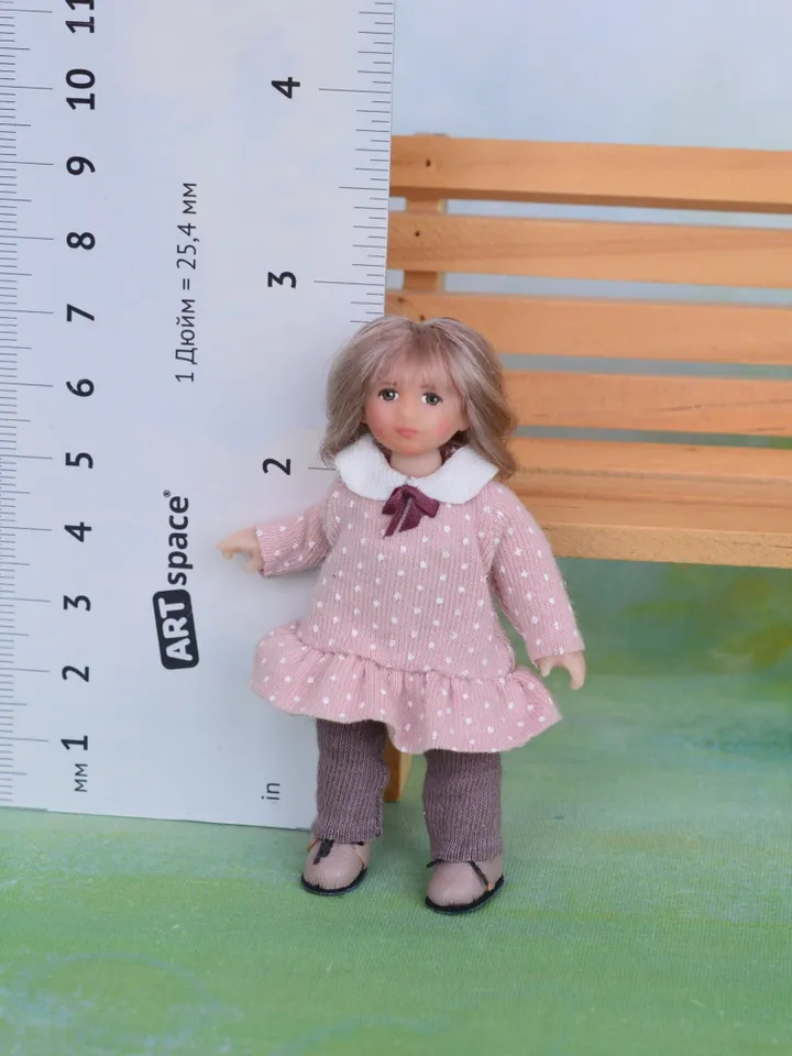 Miniature doll child in 12th scales