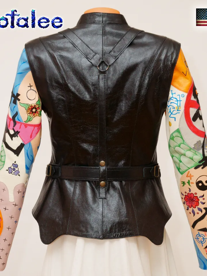 Exclusive women's handmade genuine black leather jacket bright applications sleeves. Painting lamb on leather clothes.