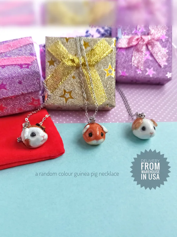 a Cute Guinea pig ball necklace in random color  (US discount)