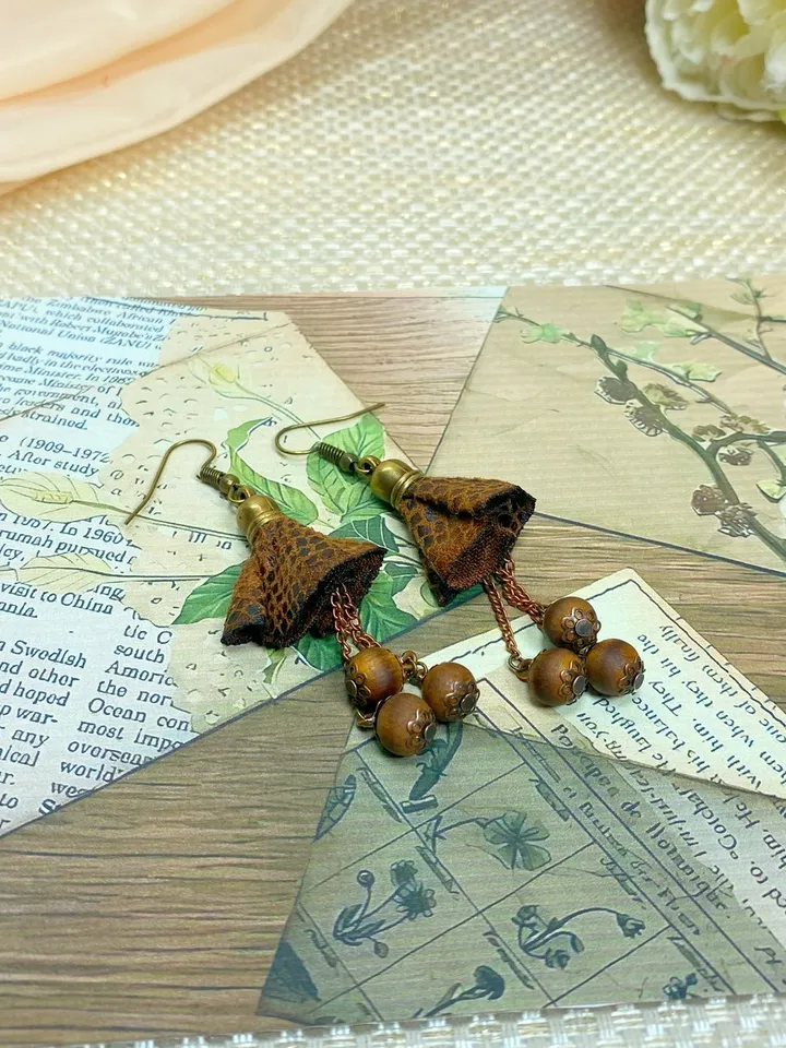 Handmade earrings with wooden beads.