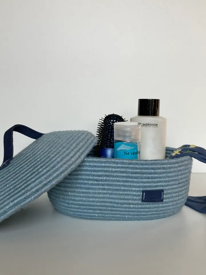 Oval jute basket with leather handle 9.5'' x 6.5''