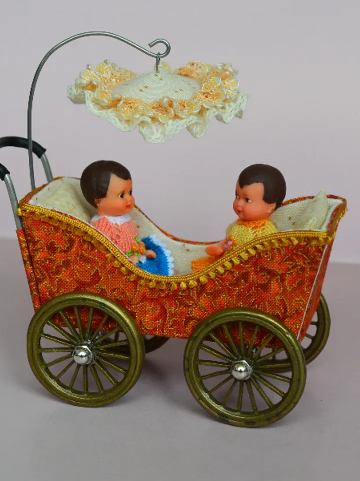 Miniature toy stroller for two small dolls. Handmade miniature stroller for small dolls.