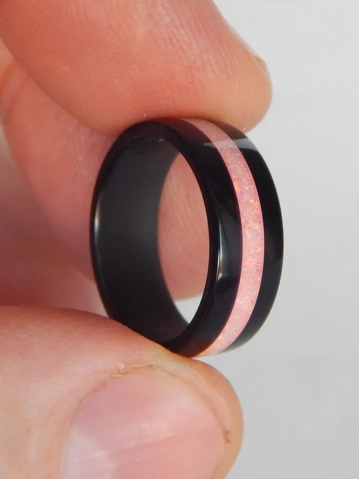 Stylish black ring. Carbon ring with synthetic opal. 5 3/4