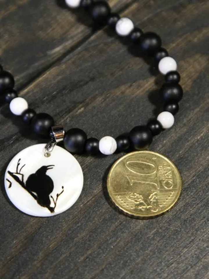 Raven or crow necklace with love rune on the other side. Nacre pearl pendant
