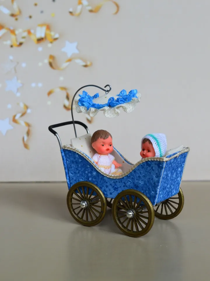 Miniature toy stroller for two small dolls. Handmade miniature stroller for small dolls.