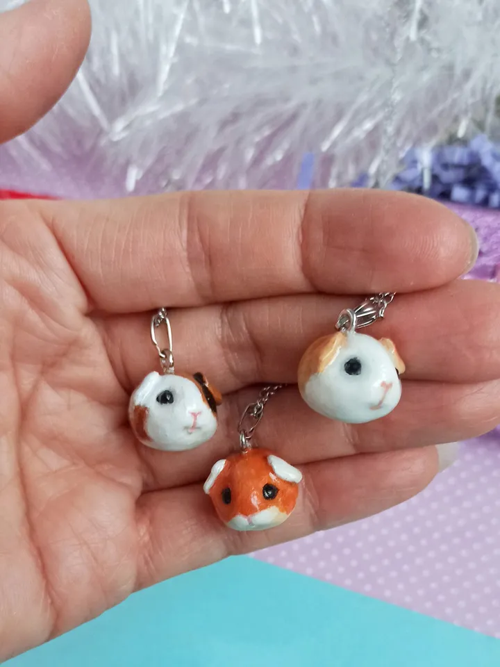 a Cute Guinea pig ball necklace in random color  (US discount)