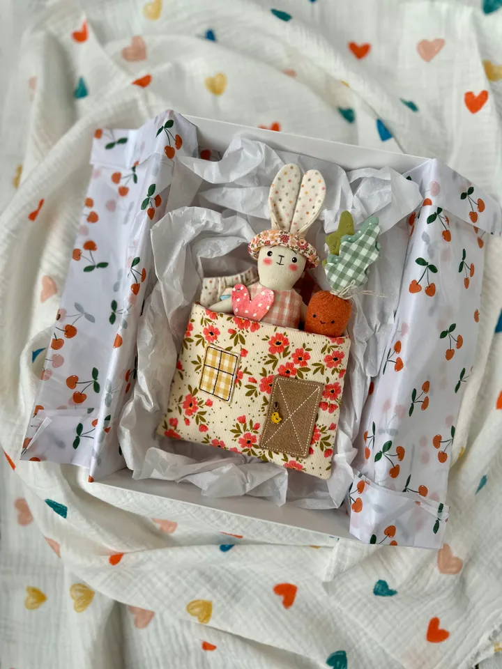 Sewing pattern hare with clothes and house