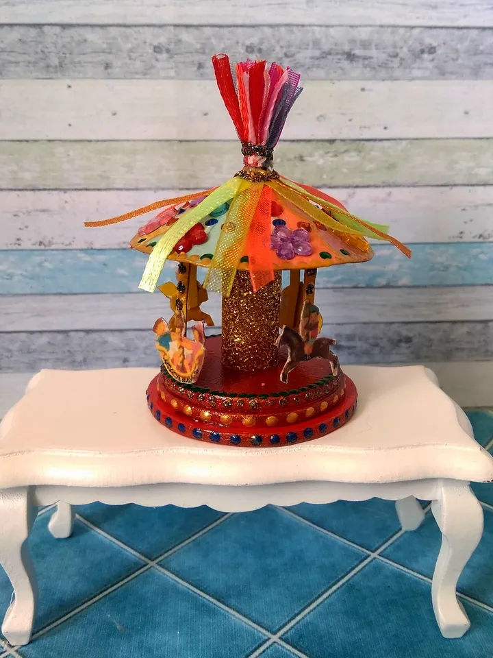 Miniature carousel. Dollhouse miniature.1:12 scale.
