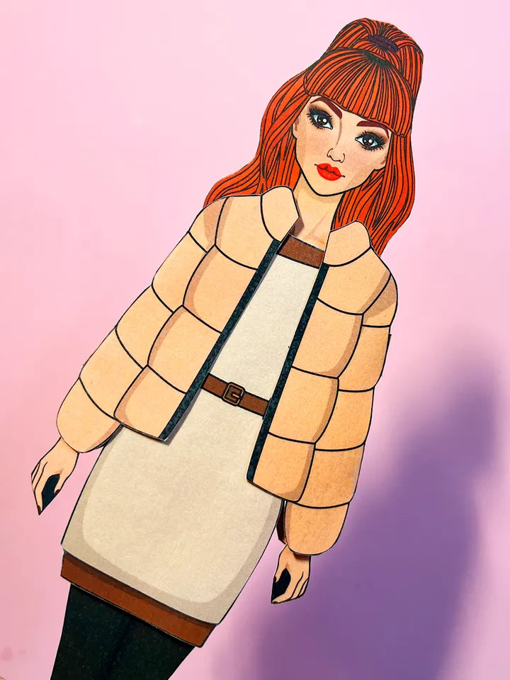 Paper doll in autumn clothes