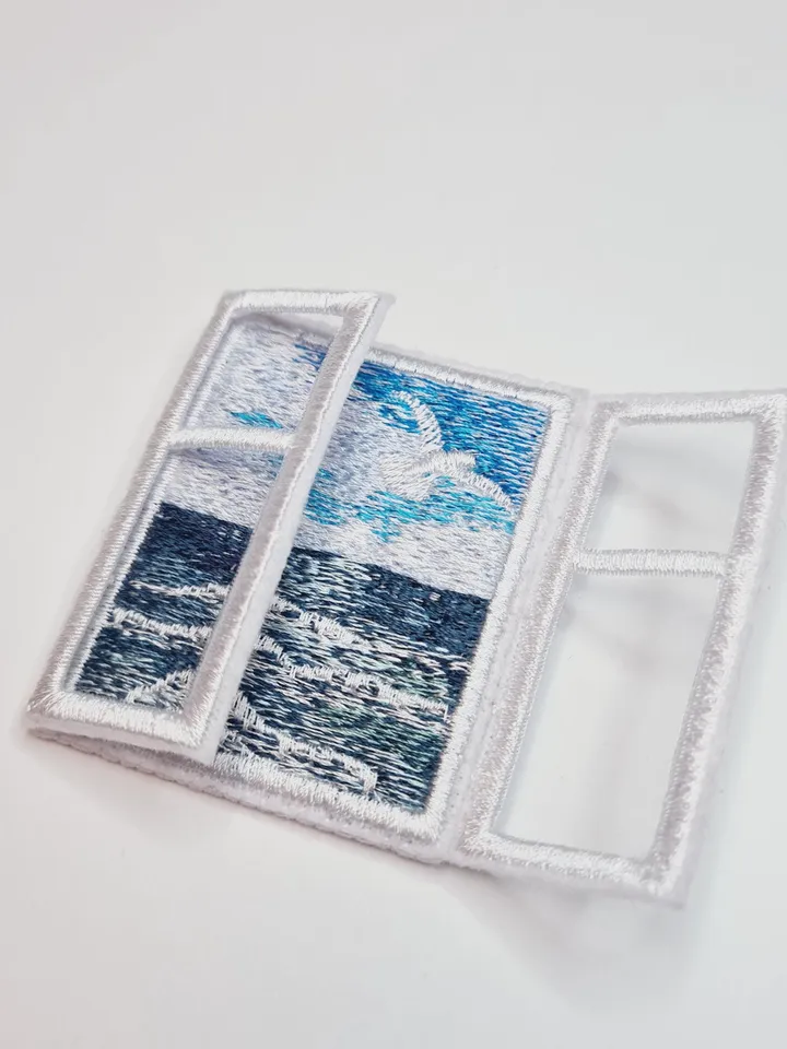 Machine embroidery design for art therapy: Brooch "Window with a sea view"